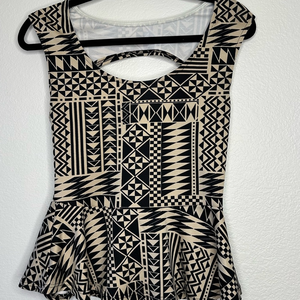Geometric Black and Cream Peplum Top